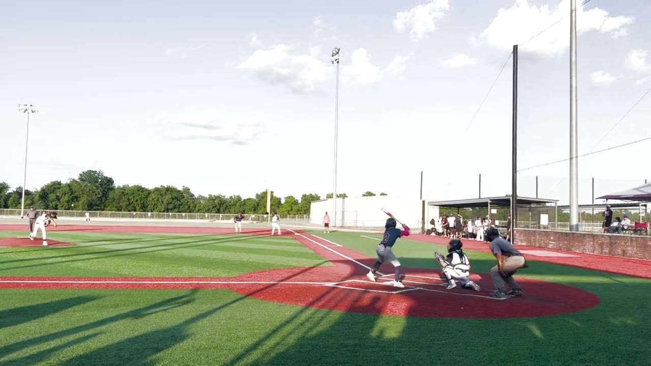 Brayden Palomino at the plate, mid-swing